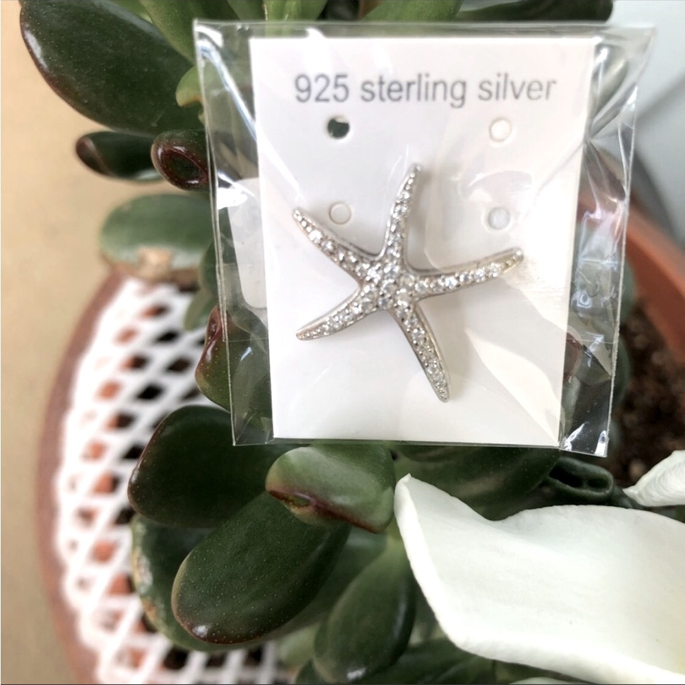 925 Sterling Silver Star- fish with cubic zirconia pave setting pendant.
